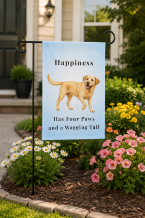 12 × 18 Brookline Lab Rescue garden flag featuring an exclusive yellow Labrador illustration with the phrase "Happiness Has Four Paws and a Wagging Tail" displayed in a landscaped front yard.
