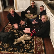 black Labrador Retriever and family